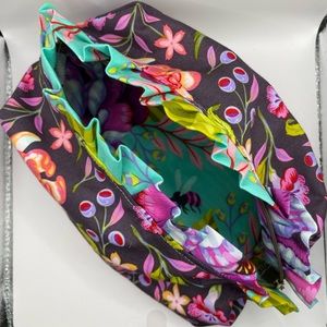 Handmade ruffled zipper bag made from Tula Pink fabric